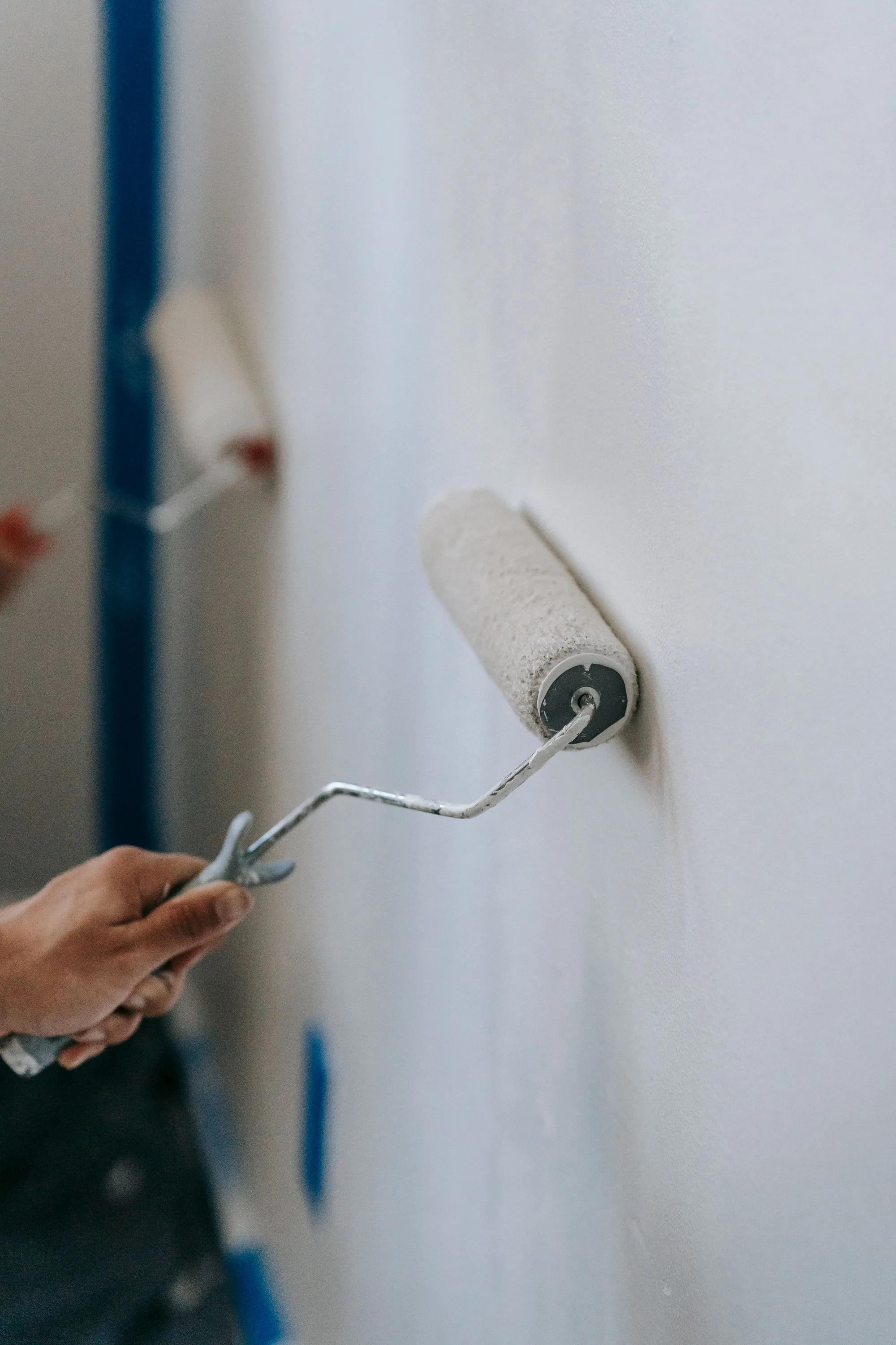 Roller working up to a crisp taped cut line